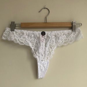 Unworn delicate lacey white thong
